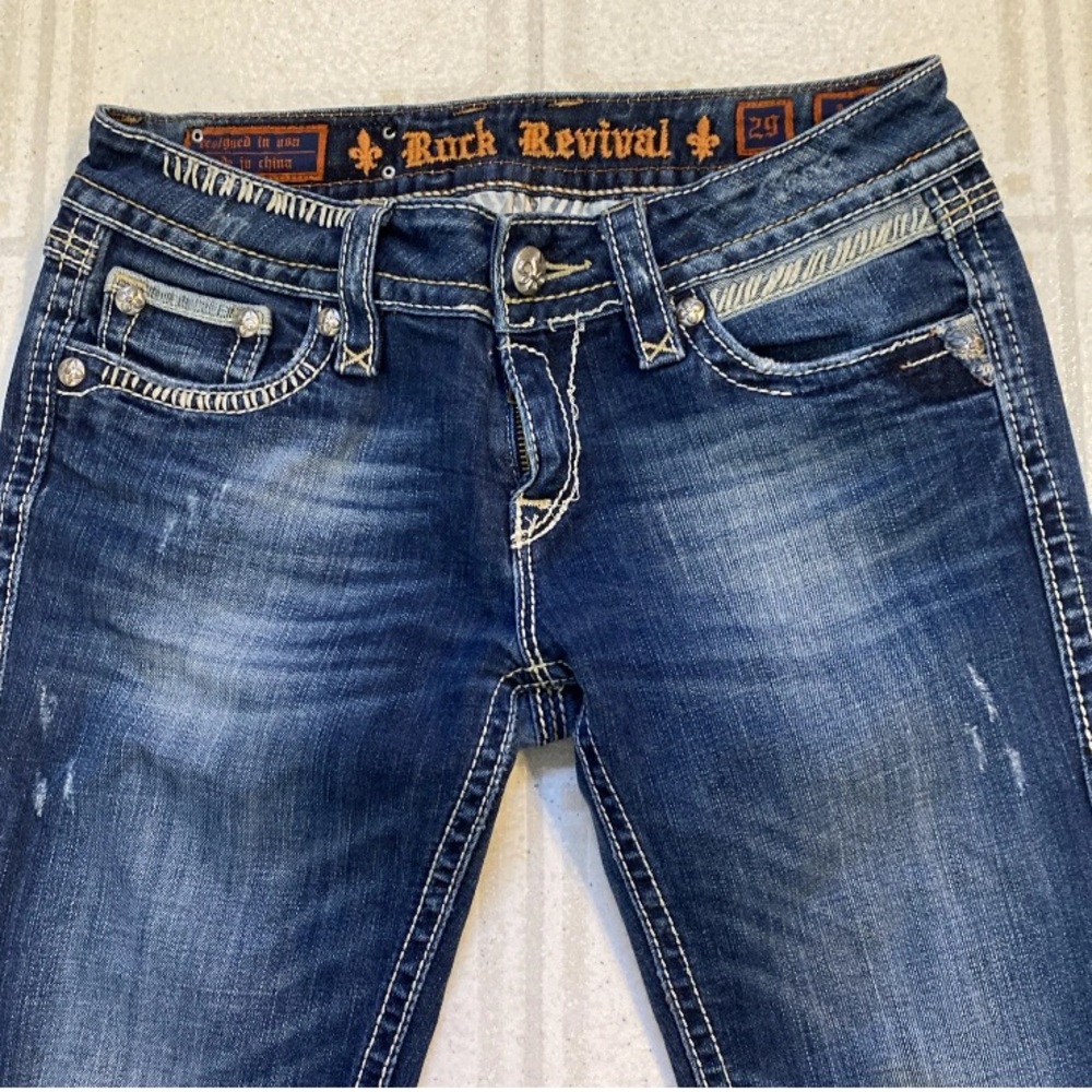 Rock And Revival Alanis Distressed Blue Boot-Cut Jeans
Size 29